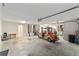 Spacious garage featuring ample storage space, a unique vintage car, and neutral color palette at 3393 Talley Ridge Dr, The Villages, FL 32162