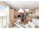 Bright kitchen with stainless steel appliances, light wood cabinetry, and a breakfast nook with natural light at 3393 Talley Ridge Dr, The Villages, FL 32162