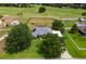 Aerial view of a home with a pool and view of the beautiful golf course at 36455 Clara St, Eustis, FL 32736