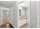 Bathroom with tile floors and a white vanity at 36455 Clara St, Eustis, FL 32736