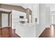 Bright kitchen with white cabinets, quartz countertops, and stainless steel appliances at 36455 Clara St, Eustis, FL 32736