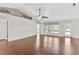 Large living area with hardwood floors and a view of the backyard at 36455 Clara St, Eustis, FL 32736