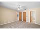 Spacious main bedroom with ensuite bathroom and walk-in closet at 36482 Doral Dr, Grand Island, FL 32735