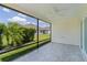 Covered patio with outdoor view of backyard and adjacent homes at 3745 Causey Ct, The Villages, FL 32163