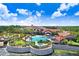 Stunning community pool area with ample seating, spa, and meticulously landscaped grounds at 503 Vigo St, Davenport, FL 33837