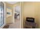 Welcoming foyer leads to an open floor plan with tile flooring, seamlessly connecting to the kitchen and dining area at 503 Vigo St, Davenport, FL 33837