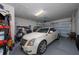 Two car garage featuring epoxy flooring at 503 Vigo St, Davenport, FL 33837
