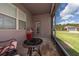 Screened in lanai with a view of the backyard and grill at 503 Vigo St, Davenport, FL 33837