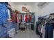 Spacious walk-in closet with ample storage and organization, and tile flooring at 503 Vigo St, Davenport, FL 33837