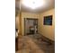 Unfinished basement space with a utility sink and water heater at 507 Bates Ave, Eustis, FL 32726