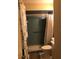 Vintage bathroom with a toilet, vanity, and tiled shower at 507 Bates Ave, Eustis, FL 32726