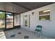 The patio is screened and tiled, providing an excellent outdoor space for relaxation and leisure at 525 Oak Dr, Tavares, FL 32778