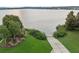 Scenic view of a boat ramp leading to a lake, surrounded by greenery at 534 Juniper Springs Dr, Groveland, FL 34736