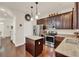 Well-equipped kitchen with stainless steel appliances, stone countertops, and a central island at 534 Juniper Springs Dr, Groveland, FL 34736