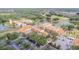 Stunning aerial view showcases the resort-style amenities, including the pool, surrounding the large lake at 537 Montage Ln, Kissimmee, FL 34759