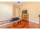 Spacious bedroom with beautiful hardwood flooring, ceiling fan and natural light at 537 Montage Ln, Kissimmee, FL 34759
