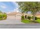 Charming single-story home features a lush landscaped yard and a welcoming two car garage at 537 Montage Ln, Kissimmee, FL 34759