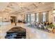 Expansive lobby featuring a grand piano, seating areas, and elegant lighting, perfect for community gatherings at 537 Montage Ln, Kissimmee, FL 34759