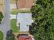An aerial view of the home showcasing the layout, landscaping, and neighborhood at 5712 Connors St, Leesburg, FL 34748