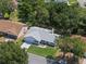 A lovely aerial shot of the property and surrounding homes in this desirable neighborhood at 5712 Connors St, Leesburg, FL 34748