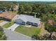 Overhead view of a well-situated home, highlighting its curb appeal, green surroundings, and community setting at 5712 Connors St, Leesburg, FL 34748