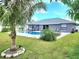 Relaxing backyard oasis with a private pool and tropical landscaping, perfect for outdoor enjoyment at 607 Baldwin Dr, Kissimmee, FL 34758
