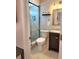 Modern bathroom with a glass-enclosed shower and updated vanity at 607 Baldwin Dr, Kissimmee, FL 34758