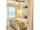 Cozy bedroom with neutral walls and a window offering natural light at 607 Baldwin Dr, Kissimmee, FL 34758