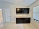 Bright dining area with tile floors and dark cabinetry and plenty of natural light from the window at 607 Baldwin Dr, Kissimmee, FL 34758