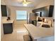 Bright kitchen with quartz counters and stainless appliances at 607 Baldwin Dr, Kissimmee, FL 34758