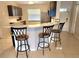 Breakfast bar with modern lighting and seating at 607 Baldwin Dr, Kissimmee, FL 34758