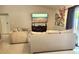 Inviting living room with comfortable seating and a contemporary entertainment center at 607 Baldwin Dr, Kissimmee, FL 34758