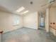 Bedroom features a chandelier, skylights, and a closet at 608 Saint Andrews Blvd, Lady Lake, FL 32159