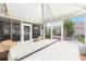 Back patio featuring a covered hot tub and an outdoor firepit, perfect for gatherings and relaxation at 616 Hartford Ln, The Villages, FL 32162