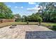 Paver patio featuring a fire pit and a backyard shed at 6259 Se 120Th Pl, Belleview, FL 34420