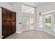 Bright kitchen with a sliding door to the porch and large windows offering plenty of natural light at 6259 Se 120Th Pl, Belleview, FL 34420