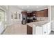 Spacious kitchen with stainless steel appliances, granite countertops, and ample cabinet space at 6259 Se 120Th Pl, Belleview, FL 34420