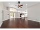 Open floor plan showcases the living room's seamless integration with the kitchen and outdoor space at 6259 Se 120Th Pl, Belleview, FL 34420