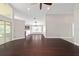 The spacious living room flows into the kitchen, creating an open and inviting atmosphere at 6259 Se 120Th Pl, Belleview, FL 34420