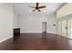 Open living room featuring hardwood floors, recessed lighting, and sliding glass doors at 6259 Se 120Th Pl, Belleview, FL 34420