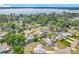 Stunning aerial view of the neighborhood and lake at 670 Oleander St, Mount Dora, FL 32757