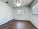 Inviting bedroom with ceiling fan, closet, and natural light at 670 Oleander St, Mount Dora, FL 32757