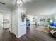 Open-concept living area showcases stylish furniture and decor, connecting seamlessly to the dining area at 670 Oleander St, Mount Dora, FL 32757