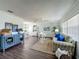 Bright and airy living area with modern furnishings, creating a welcoming space for relaxation and entertaining at 670 Oleander St, Mount Dora, FL 32757