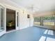 Cozy sunroom with sliding doors and ample natural light at 670 Oleander St, Mount Dora, FL 32757