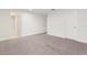 Bright bedroom featuring neutral walls with an attached bathroom at 674 Anna Ridge Rd, Minneola, FL 34715