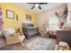Brightly-colored Bedroom with a crib, rocking chair, and fun decorations at 6816 Perch Hammock Loop, Groveland, FL 34736
