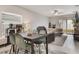 Dining room with a dark wood table and seating for four at 6816 Perch Hammock Loop, Groveland, FL 34736
