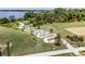 Aerial view of the community walking path, gazebo, and lakefront at 6816 Perch Hammock Loop, Groveland, FL 34736