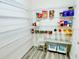 Organized walk-in pantry featuring wire shelving, providing ample storage for groceries and household items at 7394 Lussier Ct, The Villages, FL 34762